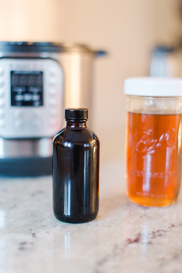 Instant Pot Elderberry Syrup Recipe to Boost Immunity. High in antioxidants, supports immune system, and anti-inflammatory.  Dried herb recipe easy to keep on hand for whenever you want to make a batch.  Quick instant pot recipe for easily making a batch of immune supporting elderberry syrup.